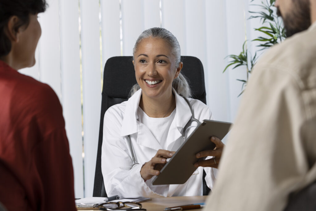 doctor describes benefits of direct primary care to couple
